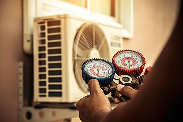 Professional Air Conditioning Service technician working in Goodland, FL